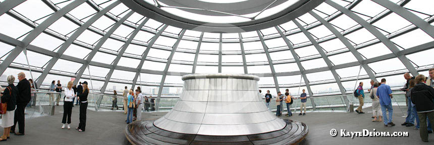 Tourists look out from the upper viewing platform of the Reichstag dome in Berlin, Germany.