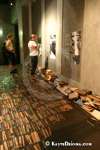 A corridor paved with books represents the books burned under the Third Reich at the Story of Berlin.