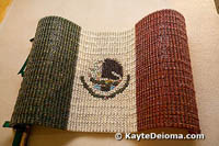 A Mexican flag, created with tiny ceramic cups, at the Mexican Folk Art Museum in Cancun, Mexico.