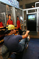 Derick tries out a recumbent bicycle at the Great Lakes Science Center in Cleveland.