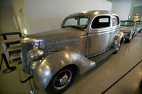 This 1936 Ford Deluxe is part of a set of three stainless steel Fords at the Crawford Auto-Aviation Museum.