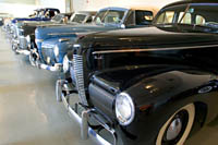 A row of classic cars at the Crawford Auto-Aviation Museum.