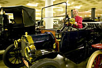 Museum Director Allan Unrein gives a lesson on how to drive a Model T at the Carawford Auto-Aviation Museum, Cleveland, Ohio.