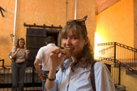 Cristina Martinez tastes a piece of roasted blue agave at Mundo Cuervo, Tequila, Mexico.