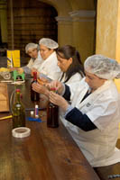 Women hand-bottle Reserva de la Familia, the oldest and most expensive grade of Cuervo tequila, at the Jose Cuervo Distillery in Tequila, Jalisco, Mexico