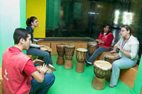 Nei'wa guides and visitors drum together at Trompo Magico.