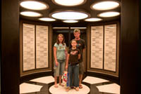 Visitors stand in the Transporter from the "Star Trek" TV series at the Hollywood Entertainment Museum. Š Kayte Deioma