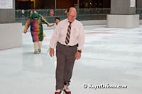 Bus driver Denis Boisvert glides around Atrium Le 1000 skating rink in Montreal on his lunch break. Š Kayte Deioma
