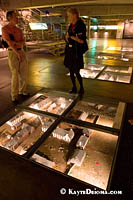 Archaeologist Virginia Elliott speaks with a visitor at the Pointe-ŕ-Calličre. Š Kayte Deioma