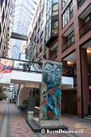 A piece of the Berlin Wall is on display in the atrium of the Montreal World Trade Center. Š Kayte Deioma