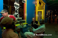 Patrons sit outside Cafe Brasil on Frenchmen Street in the Faubourg Marigny neighborhood of New Orleans, LA