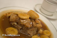 Banana bread pudding in praline sauce at Galatoire's in the French Quarter, New Orleans, LA.