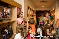 Girls and their dolls at American Girl Place