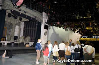 Tour guests visiting the set of Saturday Night Live in Studio 8H.