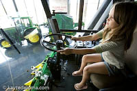 Driving a combine at the John Deere Pavilion