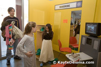 Two budding actresses get fitted for their wardrobe at the Zeum in San Francisco.
