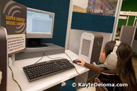 A visitor to the Zeum in San Francisco composes a soundtrack for her video production in the Sound Lab.