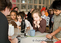 Robot inventor Simone Davalos demonstrates how to build a Soda Fountain Robot during a workshop at the Zeum.