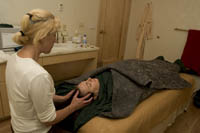 Irene gives Julie a scalp massage as part of the Chocolate Mole Mud Wrap at the Nidah Spa at the Eldorado Hotel, Santa Fe, NM
