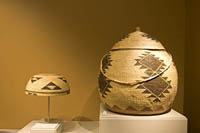 Hupa basketry hat and Yurot lidded basket at the Museum of Indian Arts and Culture, Santa Fe, NM